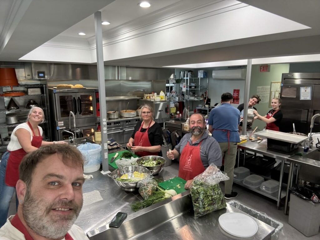 Tuscan Lodge 195 - Members and family making dinner at Ronald McDonald House